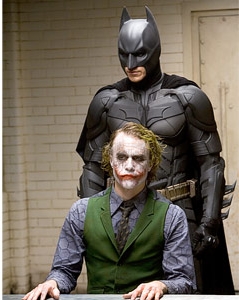 © Reuters; AP/Warner Bros. Pictures/Vaughan George Clooney als "Batman" im Film Batman & Robin; Christian Bale im Film "The Dark Knight"