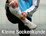 Sebastian Schweinsteiger greift auf den Socken