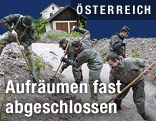 Helfer bei Aufräumarbeiten