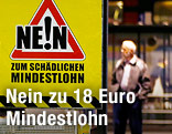 Plakat mit "Nein zu Mindestlohn"