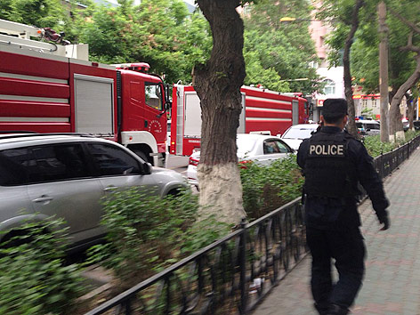 © APA/AP/Xinhua/Cao Zhiheng Polizei und Feuerwehrautos