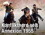 Uiguren am Pferd
