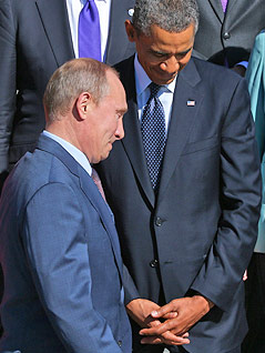 © Reuters/Sergei Karpukhin Russlands Präsident Wladimir Putin und US-Präsident Barack Obama blicken nach unten