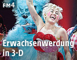 Miley Cyrus mit Tierfiguren auf der Bühne