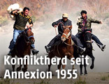 Uiguren am Pferd