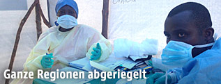 Staatliche Mitarbeiter im Kampf gegen Ebola