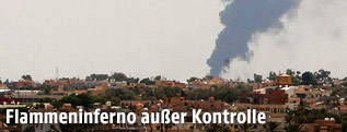 Feuer und Rauch über Tripolis