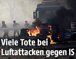 Feuer nach Luftschlägen in in Al-Rakka