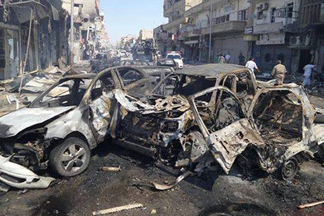 © AP/IS Autowracks in Al-Rakka