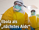 Ärzte in Schutzkleidung