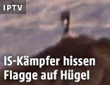 IS-Flagge auf einem Hügel