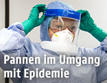 Spitalspersonal im Schutzanzug