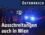 Polizeiauto hinter Absperrung