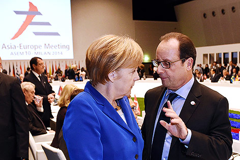 © APA/AP/Daniel Dal Zennaro Deutsche Kanzlerin Angela Merkel und der französische Präsident Francois Hollande