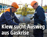 Arbeiter an einem Gasspeicher