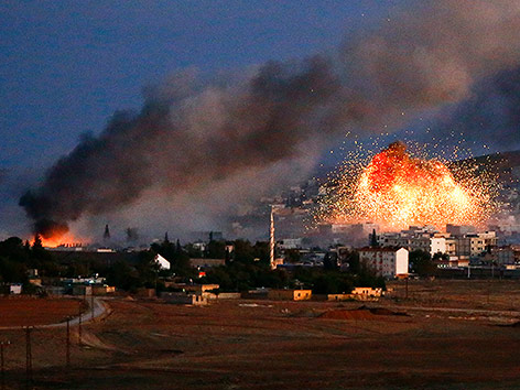 © Reuters/Kai Pfaffenbach Explosion in Kobane