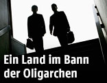 Silhouette zweier Gesch&auml;ftsm&auml;nner