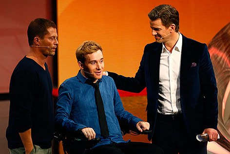 © Reuters/Ralph Orlowski Markus Lanz mit Samuel Koch und Til Schweiger