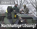 Soldaten in einem Bergepanzer