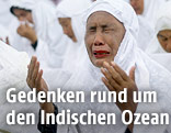 Weinende Indonesierin