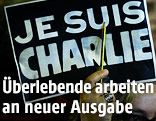 Zettel mit der Aufschrift "JE SUIS CHARLIE"