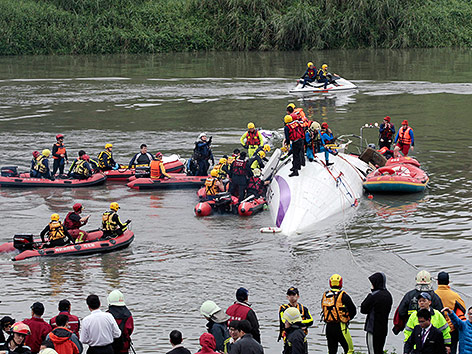 © APA/AP/Wally Santana Flugzeugwrack im Fluss