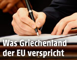 Tsipras unterschreibt Dokument