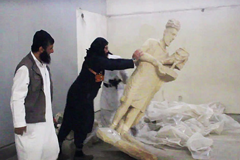 © AP/via militant social media account IS-Terroristen zerstören ein Museum