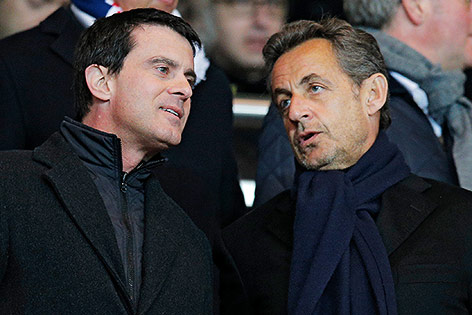 © AP/Lionel Cironneau Manuel Valls mit Nicolas s Sarkozy