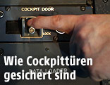 Person betätigt einen Hebel im Cockpit