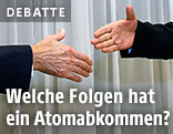 Die H&auml;nde von US-Au&szlig;enminister John Kerry und Irans Au&szlig;enminister Mohammad Javad Zarif