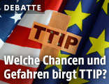 Flagge von USA und EU und ein Pflaster mit der Aufschrifft "TTIP"