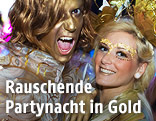 Goldgeschminkte Life-Ball-Party-Gäste