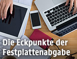 Tablet, Handy, externe Festplatte und Notebook