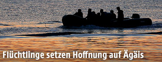 Fl&uuml;chtlinge in einem Boot