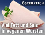 Drei Scheiben Lyoner Wurst mit Majoranzweig