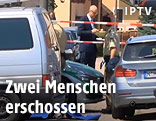 Polizisten am Tatort