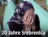 Frauer trauert neben S&auml;rgen