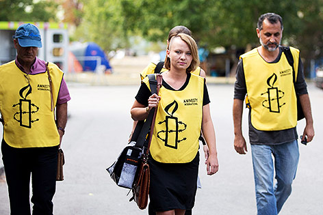 © APA/EPA/Georg Hochmuth Daniela Pichler und Kollegen von Amnesty Internation