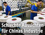 Chinesische Arbeiter in Fabrik