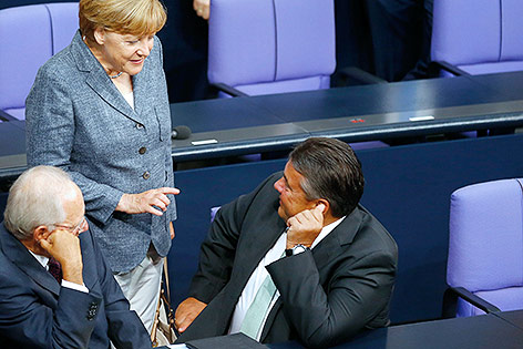 © Reuters/Axel Schmidt Angela Merkel, sigmar Gabriel, Wolgang Schäuble