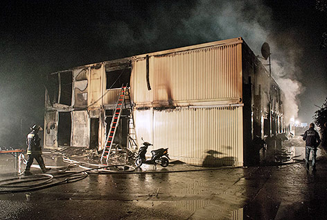© APA/EPA/dpa/Marijan Murat Gelöschter Brand in einer Unterkunft für Asylbewerber in Rottenburg, Deutschland