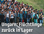 Flüchtlinge auf ungarischer Autobahn