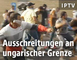 Steine werfende Flüchtlinge