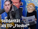 NGO-Aktion in Brüssel zeigt Orban, Cameron, Merkel und Hollande als Pappfiguren