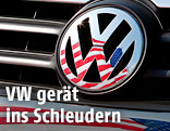 Eine US-Fahne spiegelt sich im VW-Logo
