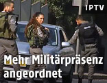 Israelische Soldaten bei einer Fahrzeugkontrolle in Jerusalem