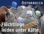 In Decken eingeh&uuml;llte Fl&uuml;chtlinge