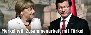Die deutsche Bundeskanzlerin Angela Merkel gemeinsam mit dem türkischen Ministerpräsident Ahmet Davutoglu