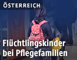 Kind mit Rucksack